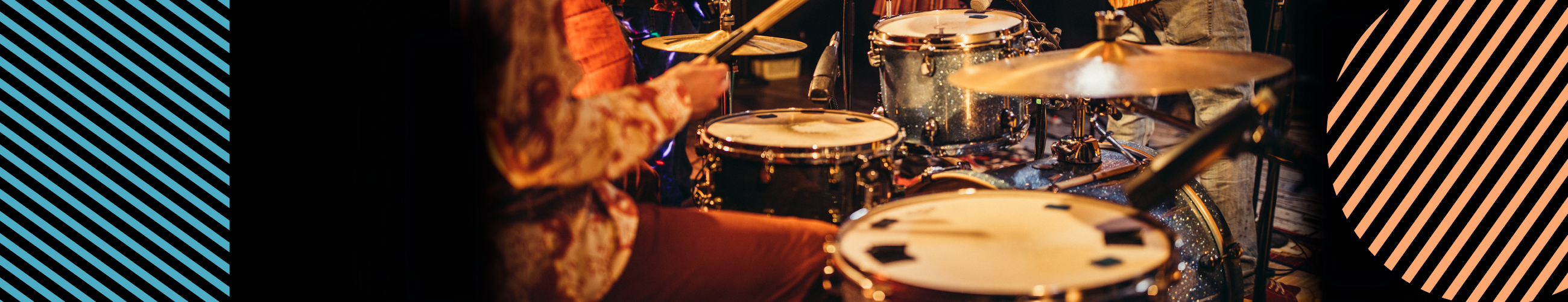 Close up of drummer's hands and drum kit