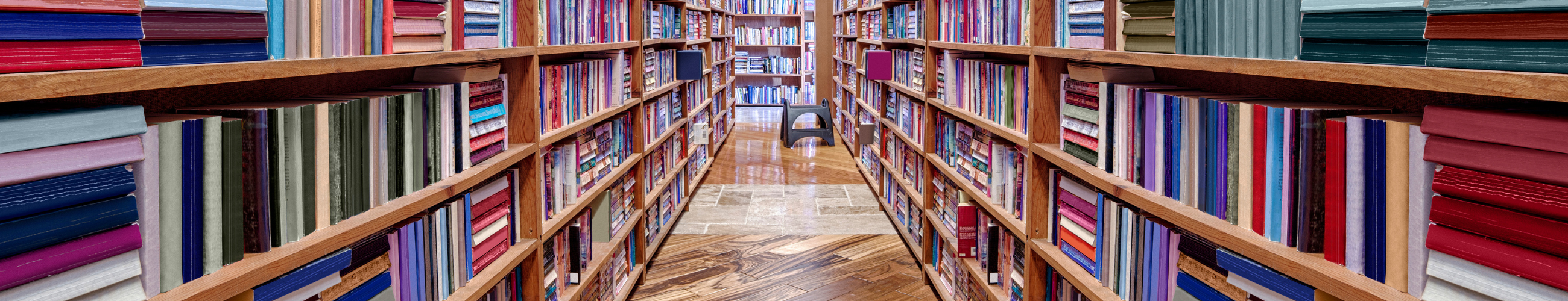 Filled bookshelves in a library